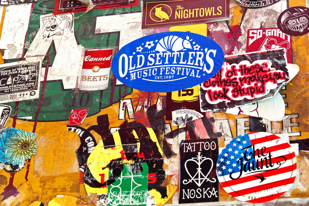 "Canned Beets" ~ A wall collage of band stickers and ads outside the Continental Club in Austin, TX.