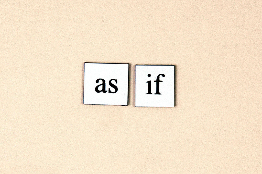 "As If" ~ Magnets off of my fridge. Photo by Ann Woodall
