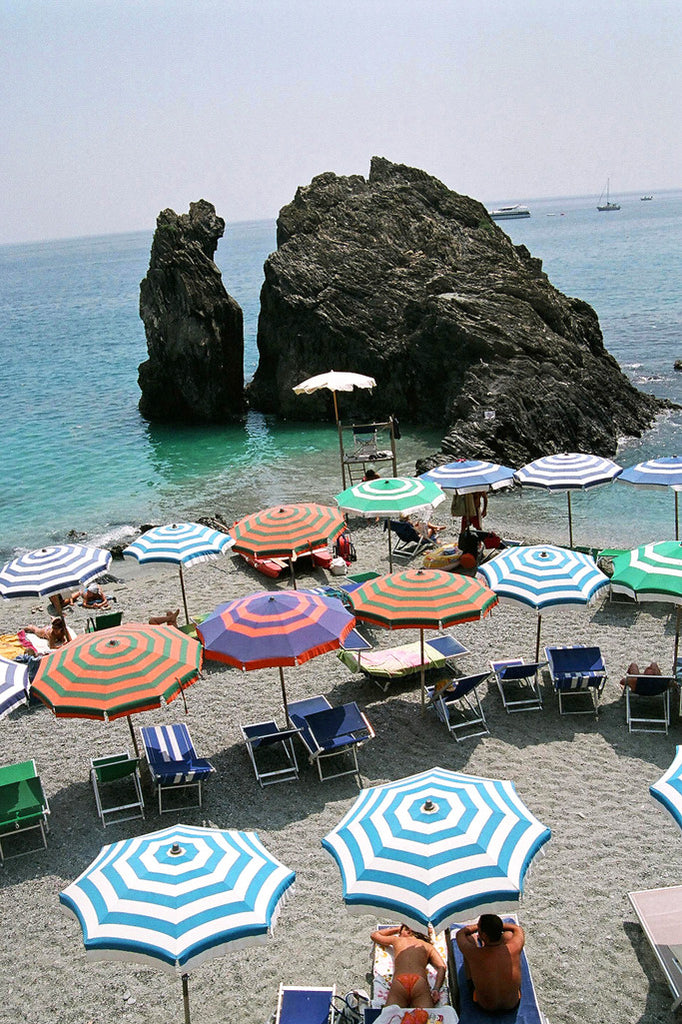 "Umbrellas" ~ A section of the beach in Monterosso, Italy. Photo by Ann Woodall