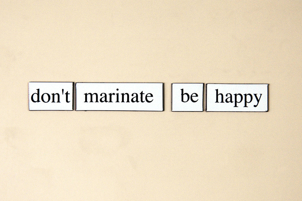 "Don't Marinate, Be Happy" ~ Words from my fridge. Photo by Ann Woodall