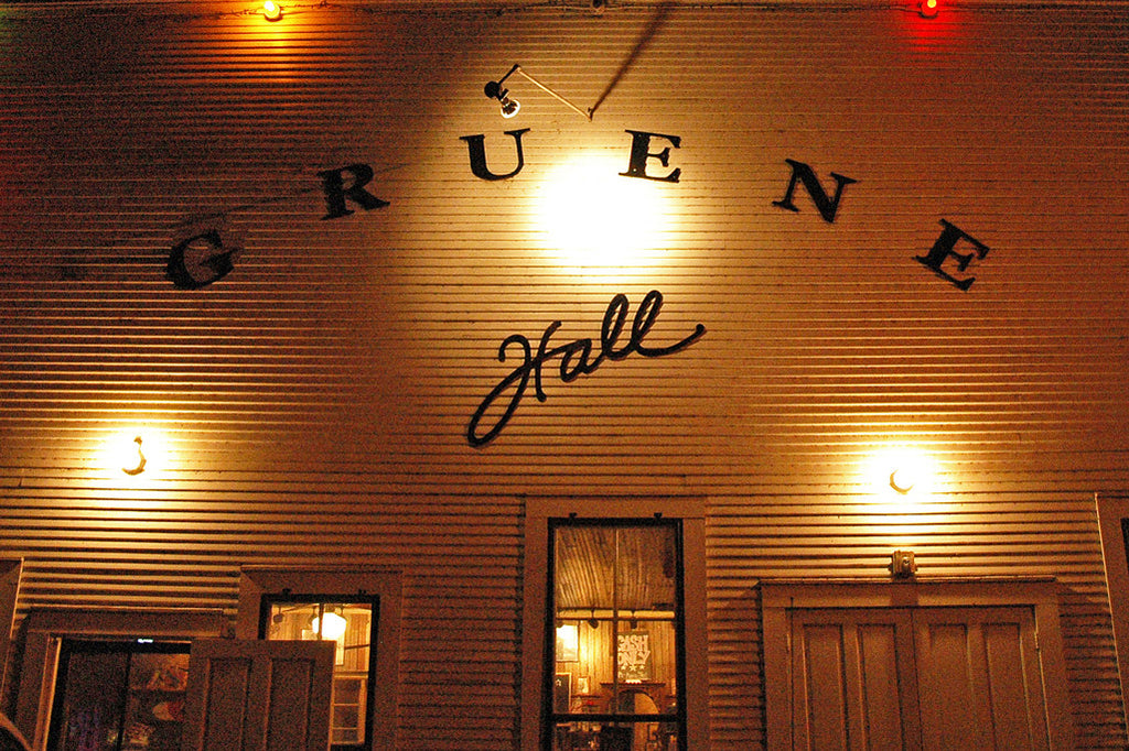 "Gruene Hall" ~ The facade of Gruene Hall dance hall at night. Photo by Ann Woodall