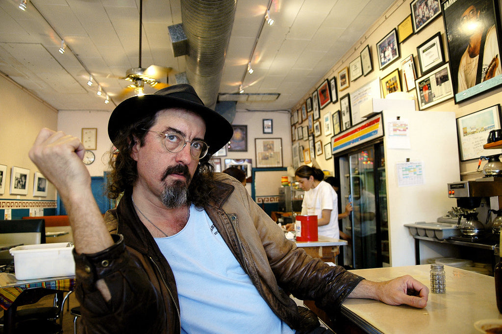 "James McMurtry at Las Manitas" ~ Musician James McMurtry at the countrer of late local eatery Las Manitas in Austin, TX. Photo by Ann Woodall