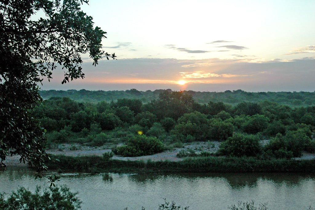 "Sunrise On the Llano" ~ Sunrise coming up over the Llano River near Mason, TX. Photo by Ann Woodall